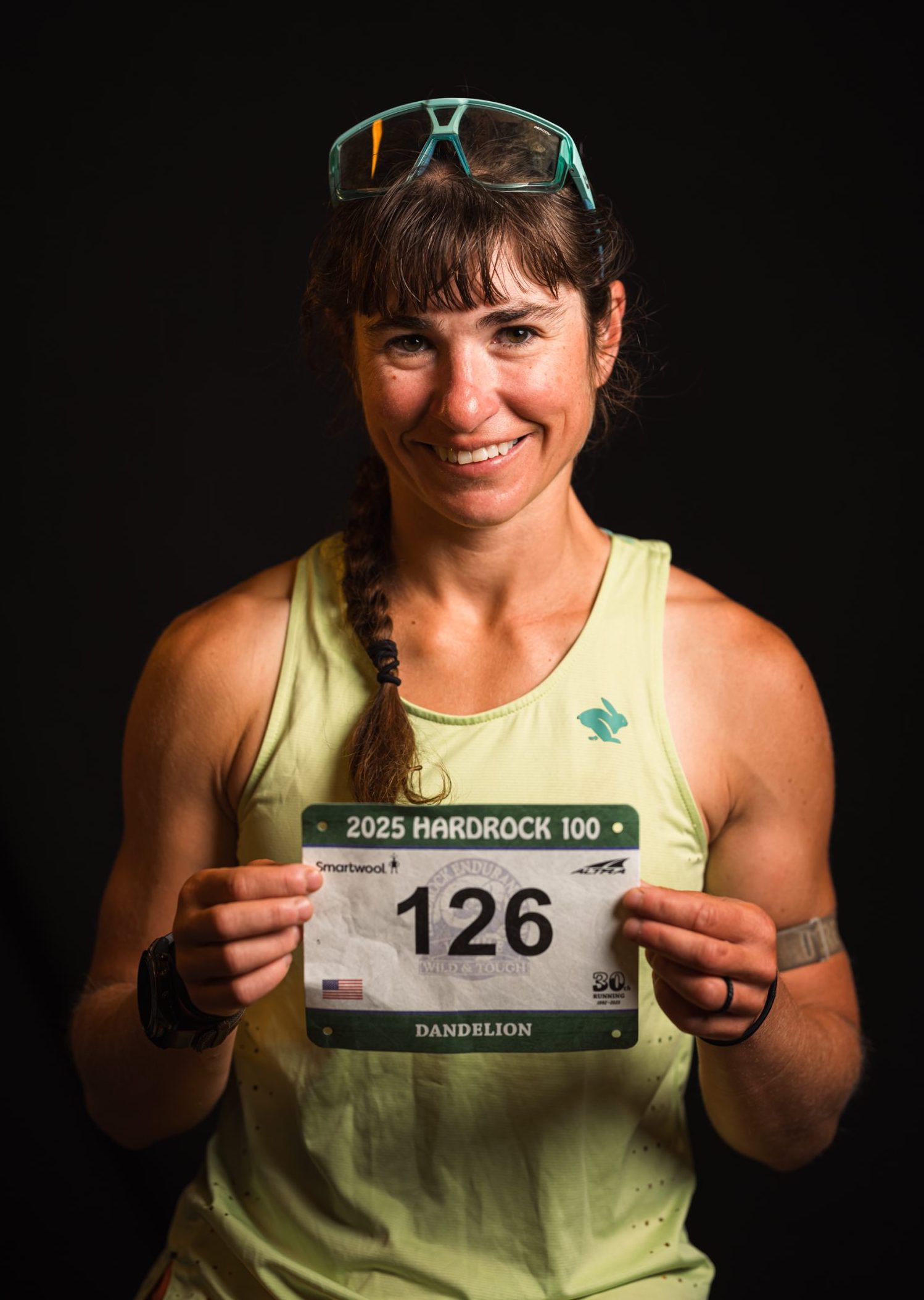 Dandelion pre-race holding her Hardrock 100 bib. PC: Travis McWhorter