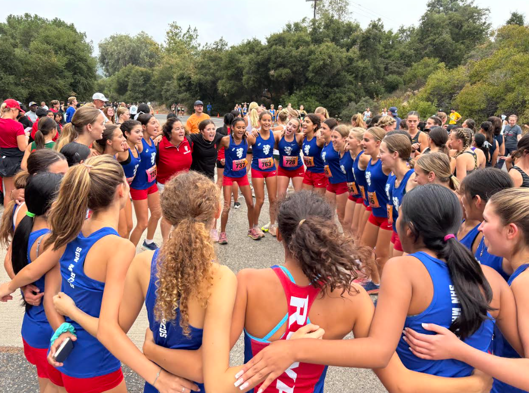 San Marcos High School girls' cross country team's pre-race huddle.