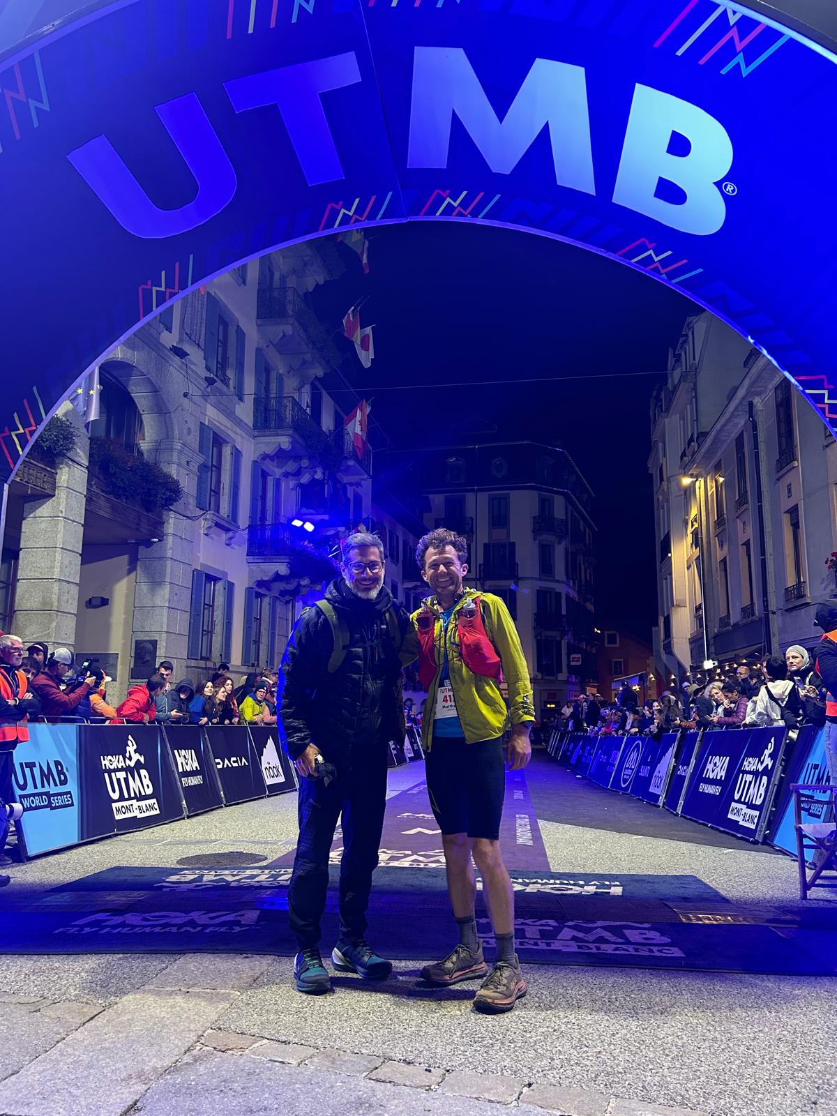 Matt at the finish line, greeted by TRR athlete and star crew, Jose Medina!