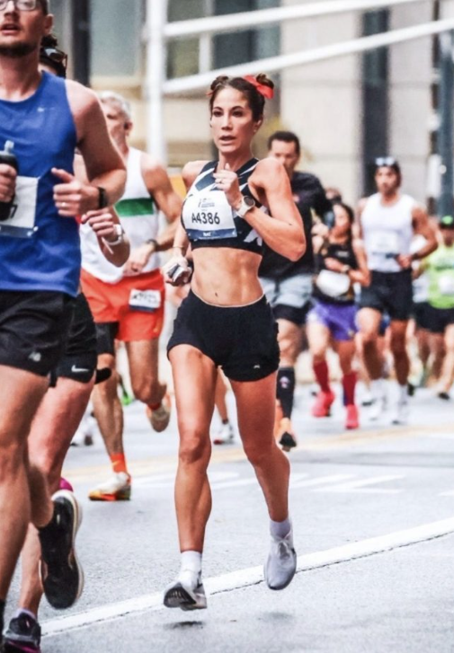 TRR Coach Natalie Lutz running the 2023 Indy Marathon.